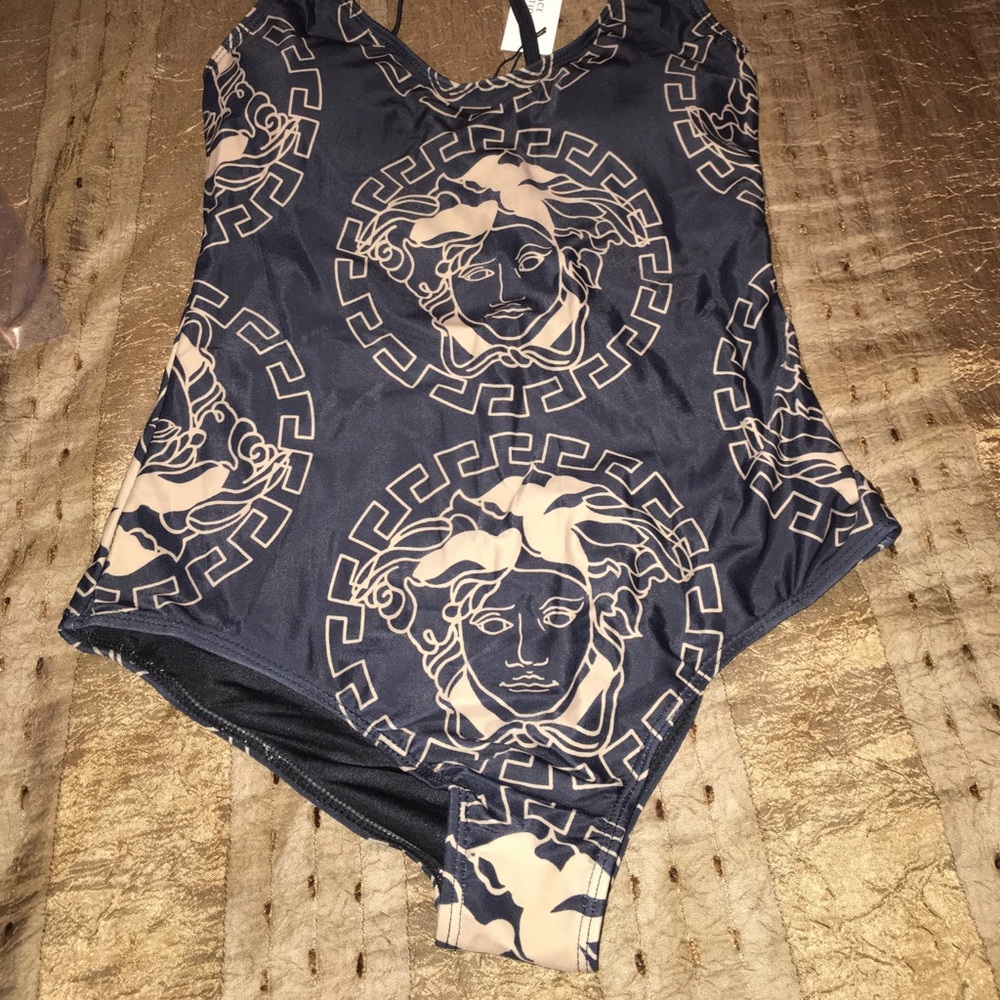 One piece fashion bathing suit m\l